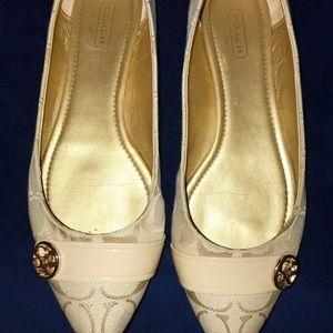 Tan coach pointed toe flats